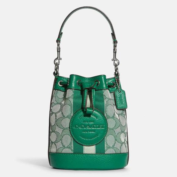 Coach Handbags - Coach Mini Dempsey Bucket Bag In Signature Jacquard With Stripe And Coach Patch